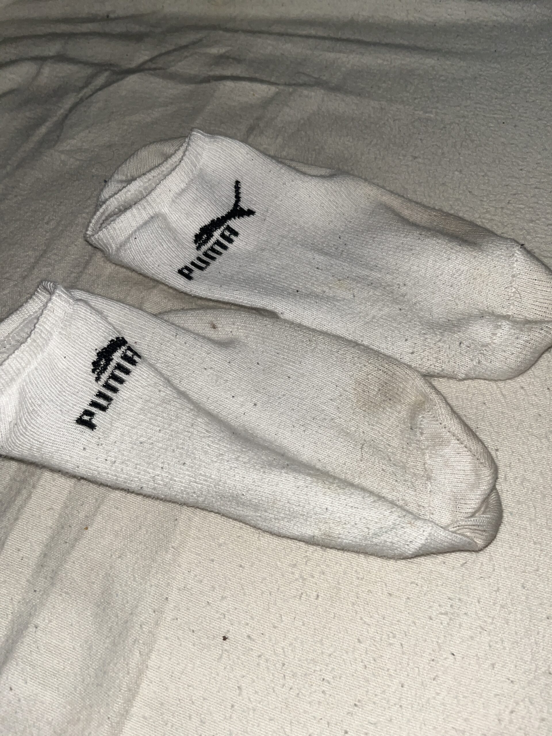 Getragene Puma Socken
