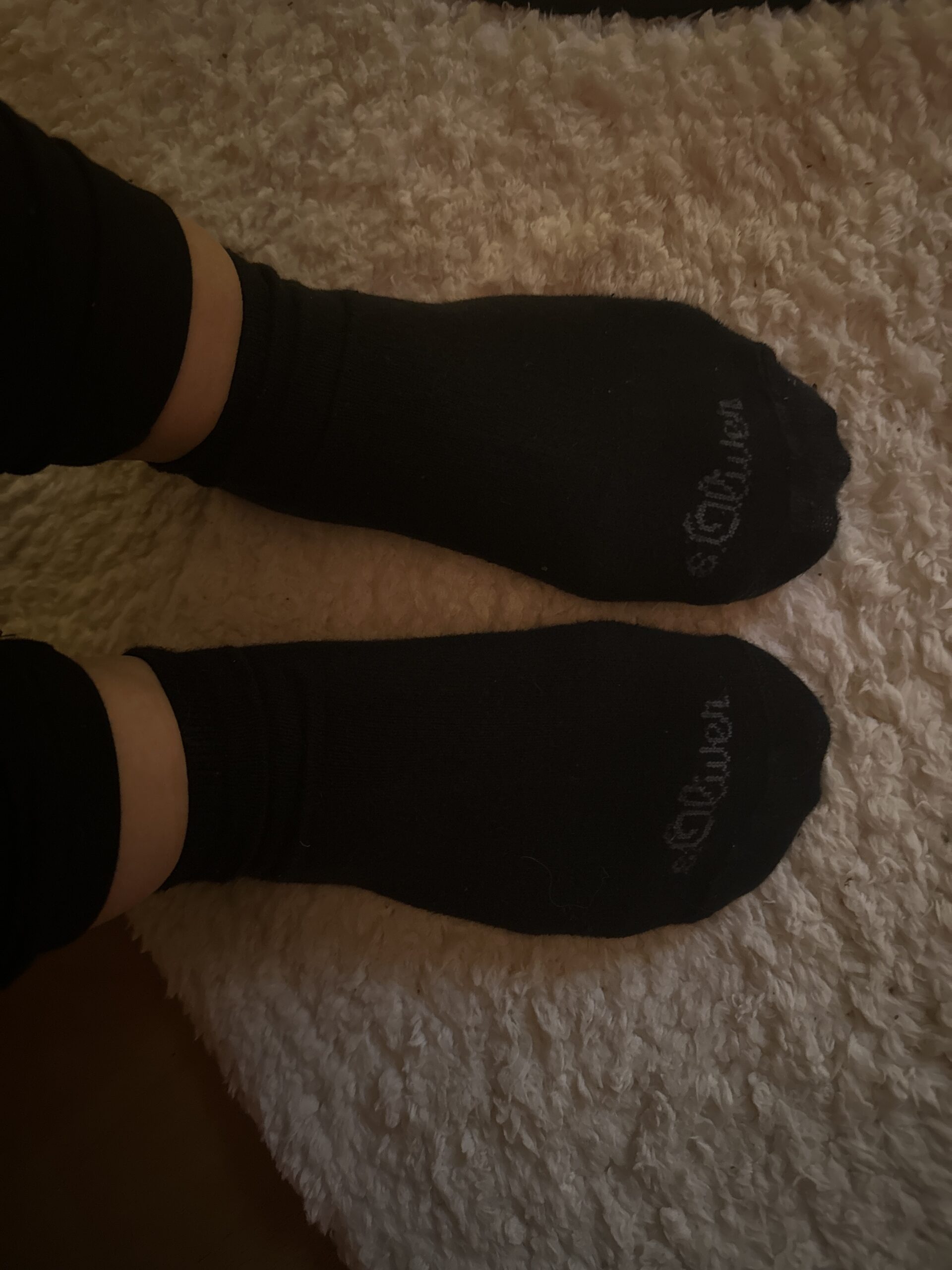 Bei der Arbeit getragene Socken